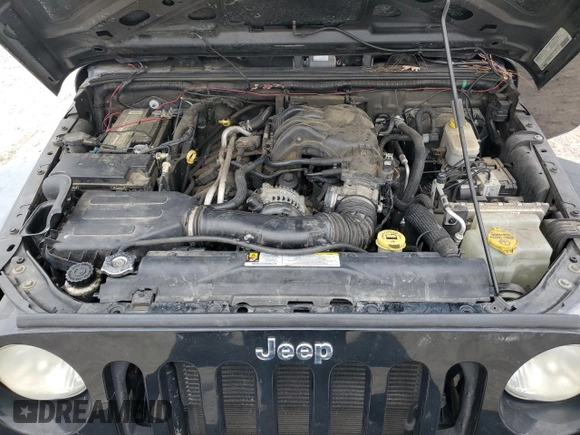 2012 Jeep Wrangler Sport with VIN 1C4GJWAG6CL167329, listed as a Copart auction lot 88895815 with 147,448 mi miles and Clean Title. Bid and sale history available at DreamBid. Image 11.