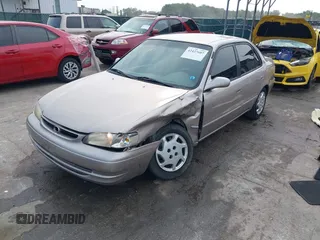 1999 Toyota Corolla VE with VIN 2T1BR12E4XC255182, listed as a IAAI auction lot 42427687 with 187,809 mi miles and . Bid and sale history available at DreamBid. Image 2.