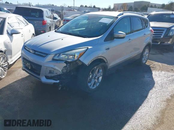 2014 Ford Escape Titanium with VIN 1FMCU0JX7EUC59643, listed as a IAAI auction lot 41082952 with 143,899 mi miles. Bid and sale history available at carsss.com. Image 18.