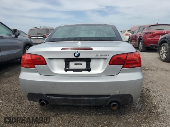 2012 BMW 3 Series 335i with VIN WBADX7C59CE744682, listed as a Copart auction lot 74878334 with Not provided miles and Salvage title. Bid and sale history available at DreamBid. Image 6.