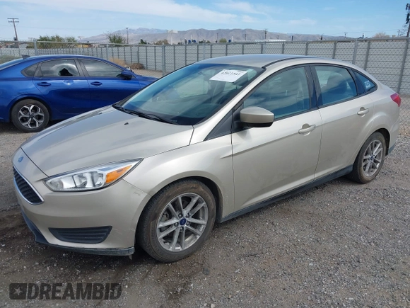 2018 Ford Focus SE with VIN 1FADP3FE7JL230870, listed as a IAAI auction lot 42021541 with 84,000 mi miles. Bid and sale history available at carsss.com. Image 17.