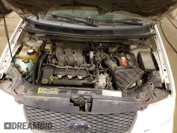 2006 Ford Freestyle SE z VIN 1FMZK01196GA42865, wystawiony jako Copart lot #51191025 z przebiegiem 163 694 mil mil oraz Tytuł czysty. Historia ofert i sprzedaży dostępna na DreamBid. Obrazek 12.