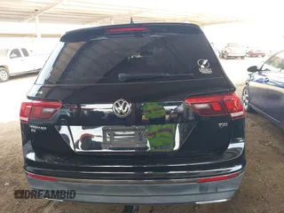 2018 Volkswagen Tiguan SEL z VIN 3VV3B7AX1JM036551, wystawiony jako IAAI lot #42170151 z przebiegiem 97 506 mil mil oraz . Historia ofert i sprzedaży dostępna na DreamBid. Obrazek 16.