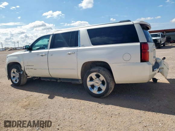 2015 Chevrolet Suburban LTZ with VIN 1GNSCKKC6FR705660, listed as a Copart auction lot 60328685 with 174,247 mi miles and Salvage title. Bid and sale history available at DreamBid. Image 2.