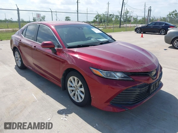2020 Toyota Camry LE with VIN 4T1L11AK3LU993342, listed as a IAAI auction lot 42033420 with 84,849 mi miles and . Bid and sale history available at DreamBid. Image 1.