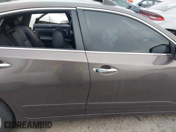 2014 Nissan Altima S with VIN 1N4AL3AP7EC185779, listed as a IAAI auction lot 41730487 with 112,503 mi miles and . Bid and sale history available at DreamBid. Image 14.