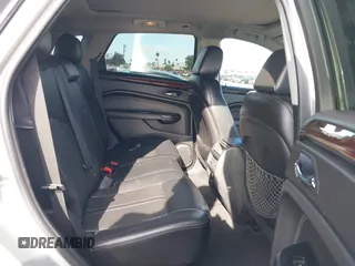 2014 Cadillac SRX Performance Collection with VIN 3GYFNCE39ES544135, listed as a IAAI auction lot 41808644 with 145,772 mi miles and . Bid and sale history available at carsss.com. Image 8.