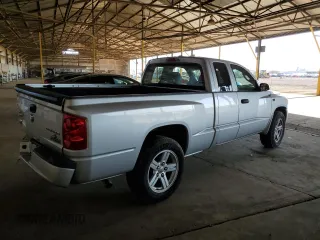 2011 Dodge Dakota with VIN 1D7RE3BP8BS510730, listed as a Copart auction lot 60486815 with 66,539 mi miles and Salvage title. Bid and sale history available at DreamBid. Image 3.