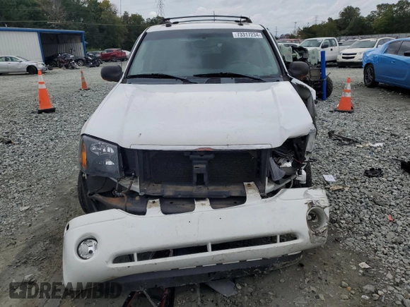 2005 GMC Envoy SLT with VIN 1GKDS13S652330496, listed as a Copart auction lot 73317234 with 191,138 mi miles and Salvage Title. Bid and sale history available at DreamBid. Image 5.