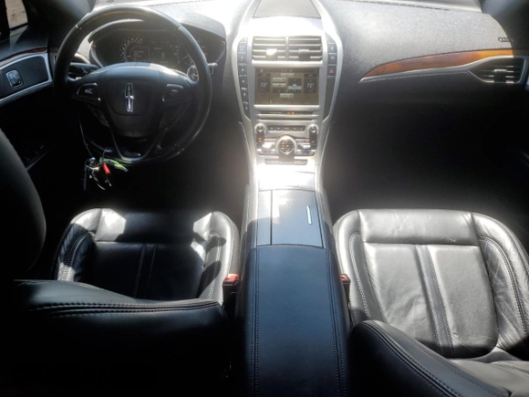 2017 Lincoln MKZ Select z VIN 3LN6L5C96HR660124, wystawiony jako Copart lot #57961315 z przebiegiem 90 770 mil mil oraz Szkoda całkowita • Salvage title. Historia ofert i sprzedaży dostępna na DreamBid. Obrazek 8.