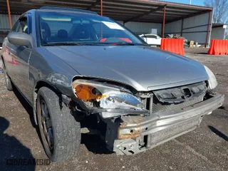 2003 Honda Civic EX with VIN 1HGEM22973L040324, listed as a IAAI auction lot 41807502 with 242,048 mi miles. Bid and sale history available at carsss.com. Image 6.