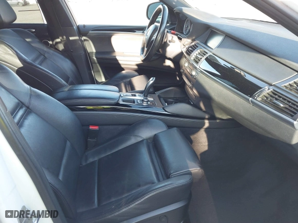 2012 BMW X6 M with VIN 5YMGZ0C59CLK14913, listed as a IAAI auction lot 41635362 with 137,979 mi miles. Bid and sale history available at carsss.com. Image 5.