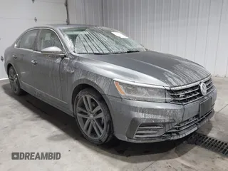 2019 Volkswagen Passat SE R-Line z VIN 1VWMA7A30KC003754, wystawiony jako IAAI lot #41493538 z przebiegiem 45 345 mil mil oraz . Historia ofert i sprzedaży dostępna na DreamBid. Obrazek 1.