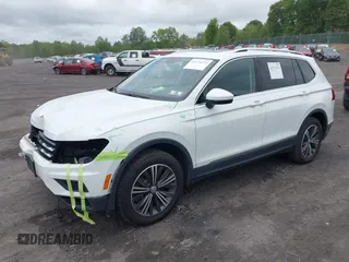 2018 Volkswagen Tiguan SEL with VIN 3VV2B7AX7JM099570, listed as a IAAI auction lot 42374274 with 87,838 mi miles and . Bid and sale history available at DreamBid. Image 2.