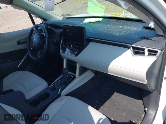 2023 Toyota Corolla Cross L with VIN 7MUAAABG0PV056373, listed as a IAAI auction lot 42495014 with 17,368 mi miles and . Bid and sale history available at DreamBid. Image 5.