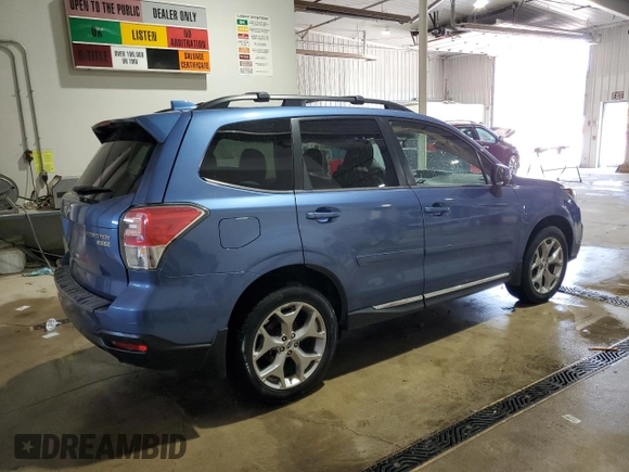 2017 Subaru Forester Touring z VIN JF2SJAWC9HH564242, wystawiony jako Copart lot #59209265 z przebiegiem Nie podano mil oraz Szkoda całkowita • Salvage title. Historia ofert i sprzedaży dostępna na DreamBid. Obrazek 3.