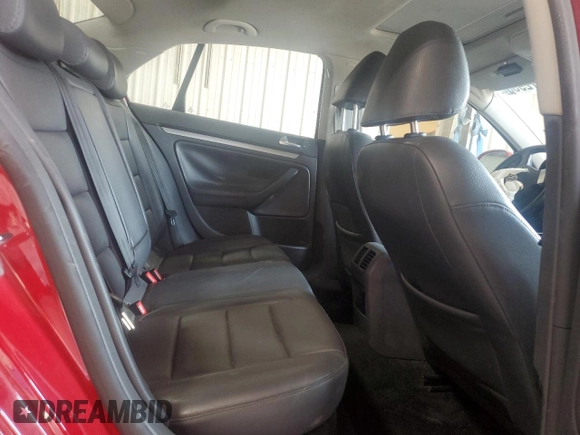 2009 Volkswagen Jetta SE z VIN 3VWRZ71KX9M127514, wystawiony jako Copart lot #59872955 z przebiegiem Nie podano mil oraz Szkoda całkowita • Salvage title. Historia ofert i sprzedaży dostępna na DreamBid. Obrazek 10.