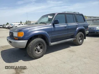 1995 Toyota Land Cruiser z VIN JT3DJ81W1S0112961, wystawiony jako Copart lot #54387925 z przebiegiem 260 236 mil mil oraz Czysty tytuł • Clean title. Historia ofert i sprzedaży dostępna na DreamBid. Obrazek 1.