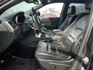 2016 Jeep Grand Cherokee High Altitude with VIN 1C4RJFCG1GC343411, listed as a Copart auction lot 48955575 with 104,755 mi miles and Salvage Title. Bid and sale history available at carsss.com. Image 7.