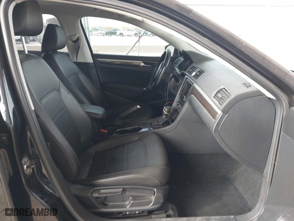2017 Volkswagen Passat 1.8T SE w/Technology with VIN 1VWGT7A36HC074702, listed as a IAAI auction lot 41805024 with 124,857 mi miles. Bid and sale history available at carsss.com. Image 5.