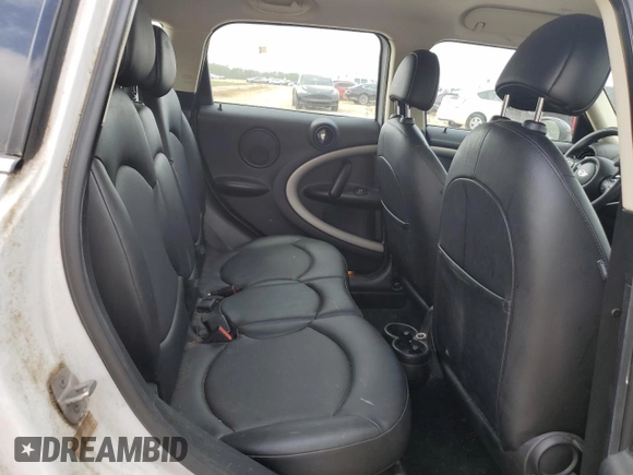 2015 MINI Countryman with VIN WMWZB3C52FWM33204, listed as a Copart auction lot 51680405 with 154,839 mi miles and Salvage Title. Bid and sale history available at DreamBid. Image 10.