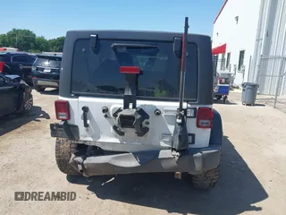 2014 Jeep Wrangler Unlimited Sport with VIN 1C4BJWDG1EL121190, listed as a IAAI auction lot 41913348 with 162,066 mi miles and . Bid and sale history available at DreamBid. Image 16.