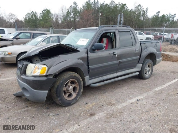 2005 Ford Explorer Sport Trac XLS with VIN 1FMZU67K25UB80616, listed as a IAAI auction lot 41505344 with 160,667 mi miles. Bid and sale history available at carsss.com. Image 2.
