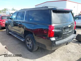 2016 Chevrolet Suburban LT with VIN 1GNSKHKC4GR275389, listed as a IAAI auction lot 41796216 with 144,776 mi miles and . Bid and sale history available at DreamBid. Image 3.