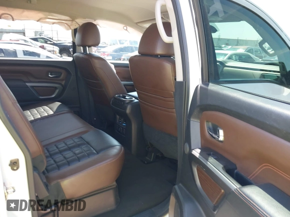2017 Nissan Titan SV with VIN 1N6AA1E5XHN532587, listed as a IAAI auction lot 42019155 with 90,496 mi miles and . Bid and sale history available at DreamBid. Image 8.