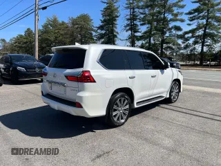 2016 Lexus LX 570 with VIN JTJHY7AX8G4198794, listed as a Copart auction lot 54615015 with 107,196 mi miles and Clean Title. Bid and sale history available at DreamBid. Image 4.