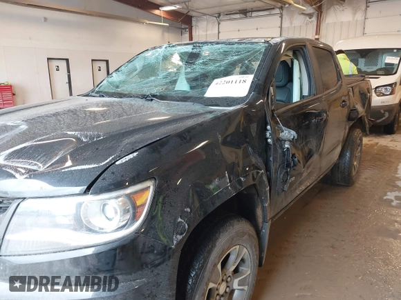 2019 Chevrolet Colorado 4WD Z71 with VIN 1GCGTDEN2K1121689, listed as a IAAI auction lot 42201118 with 96,351 mi miles and . Bid and sale history available at DreamBid. Image 12.