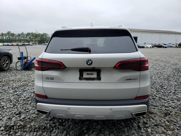 2020 BMW X5 xDrive40i with VIN 5UXCR6C06L9B11252, listed as a Copart auction lot 59634655 with Not provided miles and Salvage title. Bid and sale history available at DreamBid. Image 6.