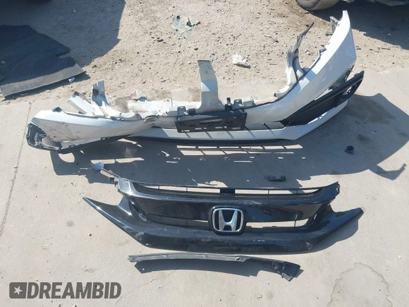 2019 Honda Civic Sport with VIN 19XFC2F81KE024702, listed as a IAAI auction lot 42018077 with 98,613 mi miles and . Bid and sale history available at DreamBid. Image 11.
