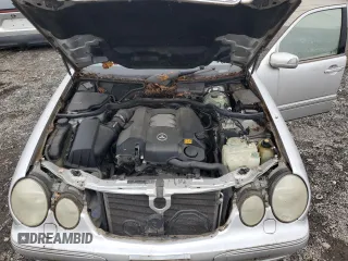 2000 Mercedes-Benz E-Class AWD with VIN WDBJH82J6YX039226, listed as a Copart auction lot 72559034 with 213,680 mi miles and Clean Title. Bid and sale history available at carsss.com. Image 11.