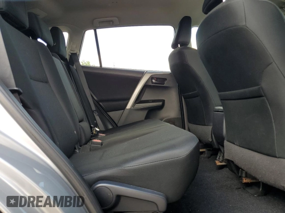 2018 Toyota RAV4 LE with VIN 2T3BFREV8JW788362, listed as a Copart auction lot 64053735 with 124,668 mi miles and Salvage title. Bid and sale history available at DreamBid. Image 11.