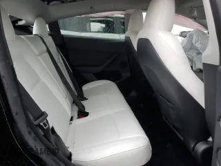 2024 Tesla Model Y z VIN 7SAYGDED7RF018059, wystawiony jako Copart lot #54273785 z przebiegiem 30 080 mil mil oraz Szkoda całkowita • Salvage title. Historia ofert i sprzedaży dostępna na DreamBid. Obrazek 10.