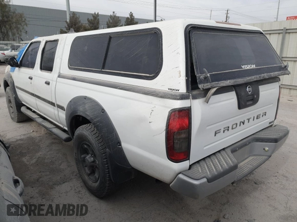 2002 Nissan Frontier XE z VIN 1N6ED29X12C348006, wystawiony jako Copart lot #41897905 z przebiegiem 91 363 mil mil oraz Szkoda całkowita • Salvage title. Historia ofert i sprzedaży dostępna na DreamBid. Obrazek 2.