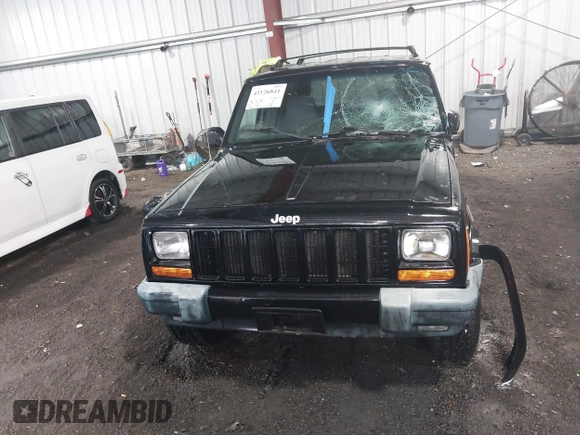 2000 Jeep Cherokee z VIN 1J4FF48S8YL216995, wystawiony jako IAAI lot #42126841 z przebiegiem 178 000 mil mil oraz . Historia ofert i sprzedaży dostępna na DreamBid. Obrazek 12.