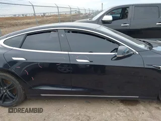 2017 Tesla Model S 100D z VIN 5YJSA1E27HF208282, wystawiony jako IAAI lot #41362736 z przebiegiem 173 162 mil mil oraz . Historia ofert i sprzedaży dostępna na DreamBid. Obrazek 13.