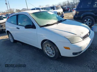2006 Ford Focus S z VIN 1FAFP31N06W160344, wystawiony jako IAAI lot #41321442 z przebiegiem Nie podano mil oraz . Historia ofert i sprzedaży dostępna na DreamBid. Obrazek 1.