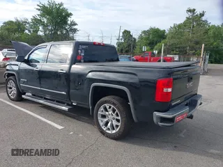 2014 GMC Sierra 1500 SLT with VIN 3GTU2VEC9EG428809, listed as a IAAI auction lot 42780648 with 170,828 mi miles and . Bid and sale history available at DreamBid. Image 3.