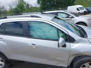 2021 Chevrolet Trax LT with VIN KL7CJPSM5MB364683, listed as a IAAI auction lot 42613395 with 48,047 mi miles and . Bid and sale history available at DreamBid. Image 14.