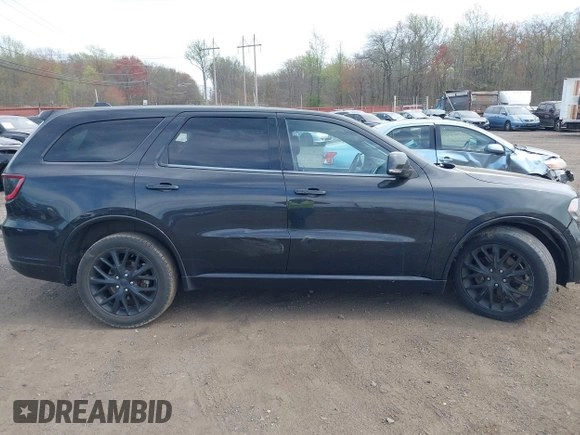 2015 Dodge Durango R/T with VIN 1C4SDJCT3FC156310, listed as a IAAI auction lot 42061041 with 99,621 mi miles and . Bid and sale history available at carsss.com. Image 13.