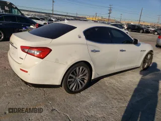 2015 Maserati Ghibli S Q4 with VIN ZAM57RTA3F1138060, listed as a Copart auction lot 74828063 with 73,536 mi miles. Bid and sale history available at carsss.com. Image 3.
