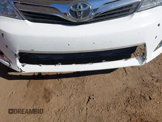 2014 Toyota Camry SE with VIN 4T1BK1FK2EU543220, listed as a IAAI auction lot 41416785 with 198,011 mi miles. Bid and sale history available at carsss.com. Image 6.