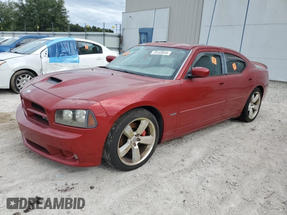 2006 Dodge Charger SRT-8 with VIN 2B3LA73W36H369833, listed as a Copart auction lot 78132814 with 38,623 mi miles and Salvage Title. Bid and sale history available at DreamBid. Image 1.