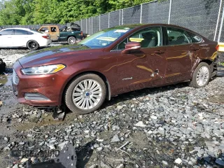 2016 Ford Fusion SE Hybrid with VIN 3FA6P0LU5GR377735, listed as a Copart auction lot 58791955 with 135,798 mi miles and Salvage title. Bid and sale history available at DreamBid. Image 1.