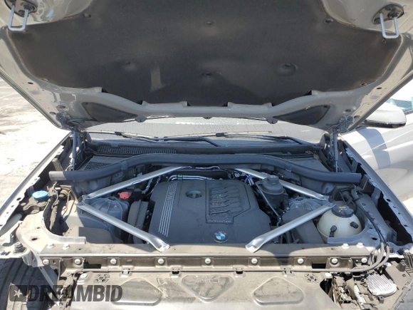 2022 BMW X6 xDrive40i z VIN 5UXCY6C01N9M95573, wystawiony jako Copart lot #54049805 z przebiegiem 24 031 mil mil oraz Szkoda całkowita • Salvage title. Historia ofert i sprzedaży dostępna na DreamBid. Obrazek 12.