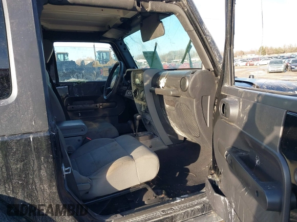 2009 Jeep Wrangler Rubicon with VIN 1J8GA641X9L706706, listed as a IAAI auction lot 41520129 with 176,345 mi miles. Bid and sale history available at carsss.com. Image 5.