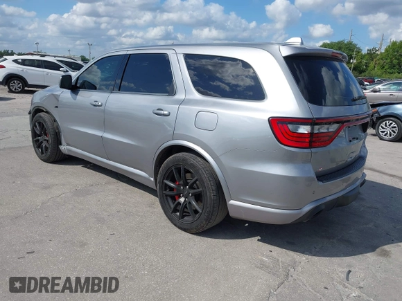 2018 Dodge Durango SRT with VIN 1C4SDJGJ6JC366644, listed as a IAAI auction lot 41906182 with 54,490 mi miles and . Bid and sale history available at DreamBid. Image 3.